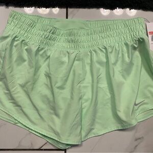 Nike Dri-fit running shorts in lime green. Size Large